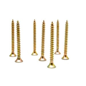 Seven brass-colored screws arranged upright in a row on a white background, showcasing the quality craftsmanship available at Scott's Hill Hardware.