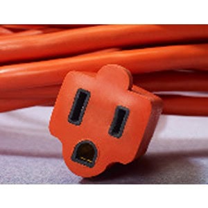 A close-up of an orange electrical extension cord with a three-prong female outlet, available at Scott's Hill Hardware.